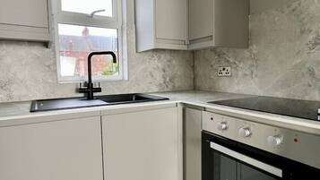 Fridge, oven, coffee/tea maker, toaster