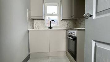 Fridge, oven, coffee/tea maker, toaster