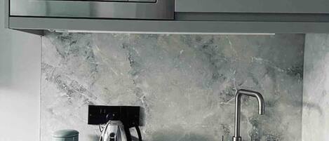 Fridge, microwave, stovetop, coffee/tea maker