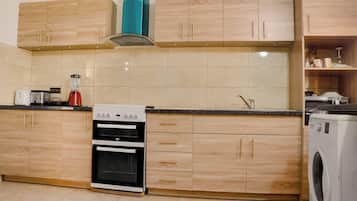 Apartment | Private kitchen | Fridge, microwave, oven, stovetop