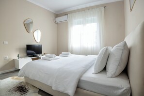 1 slaapkamer, een strijkplank/strijkijzer, wifi, beddengoed