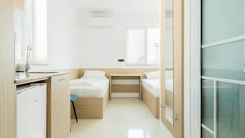 Chambre, 1 chambre, non-fumeurs, vue ville | Bureau, espace de travail pour ordinateur portable, Wi-Fi gratuit