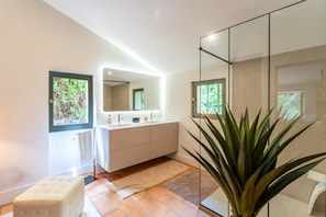Shower, hair dryer, towels, soap