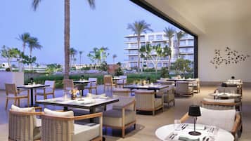 4 restaurants, breakfast, lunch, dinner served; international cuisine