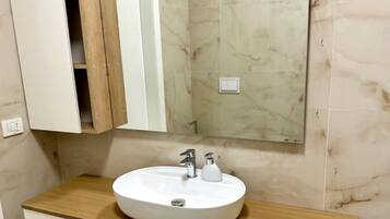 Hair dryer, towels, toilet paper