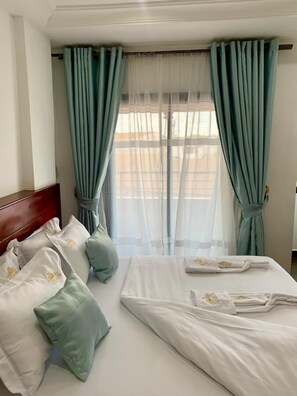 1 bedroom, desk, blackout drapes, iron/ironing board