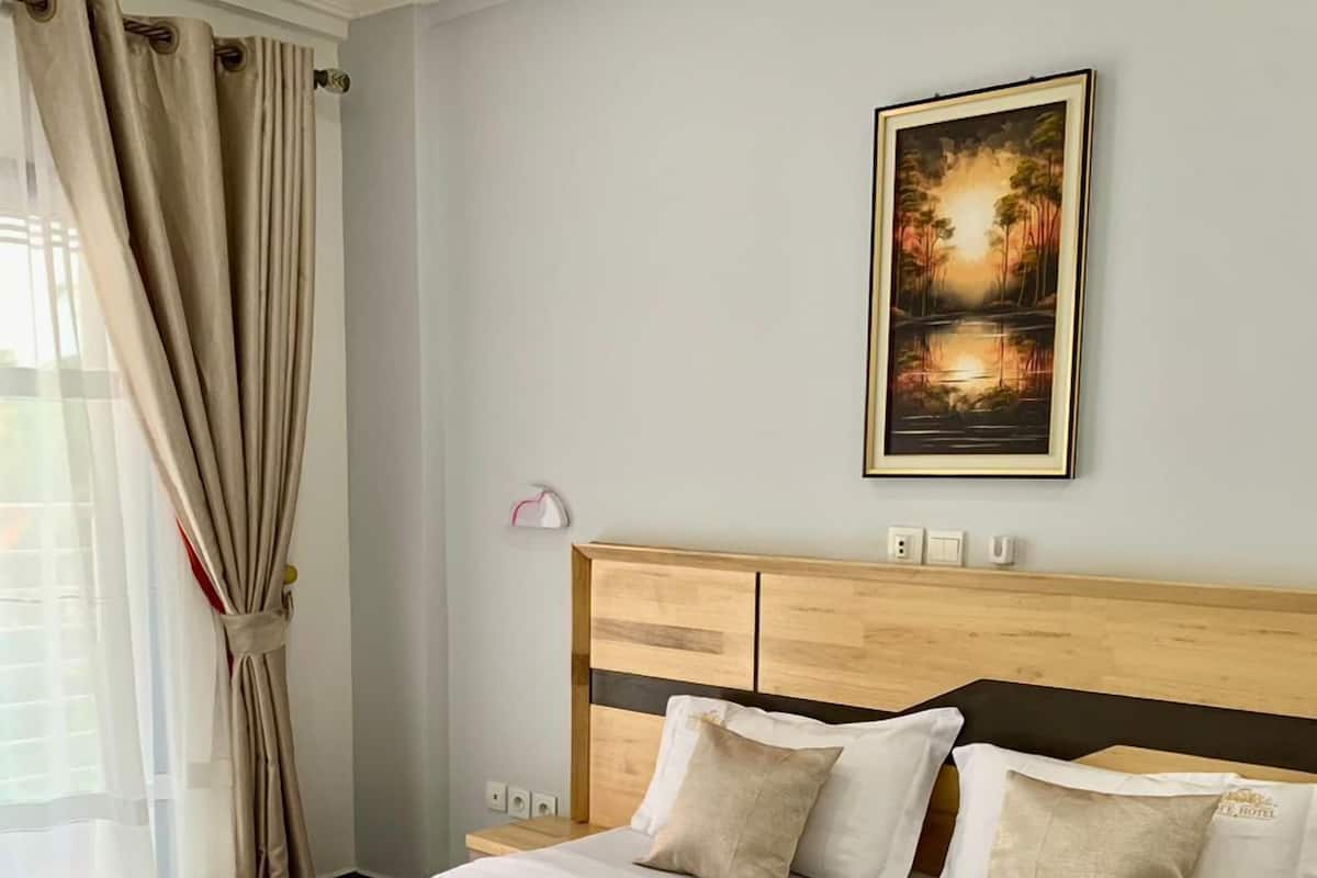 1 bedroom, desk, blackout curtains, iron/ironing board