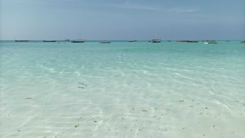 On the beach, white sand