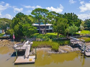 House, Multiple Bedrooms | Property grounds - Eclectic Creek Front Retreat 8 Bedroom Home by Peace Vacations (Georgetown)