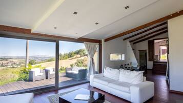 Villa | Living area | Fireplace