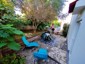 Appartement, 2 chambres, terrasse, vue jardin | Enceinte de l’hébergement