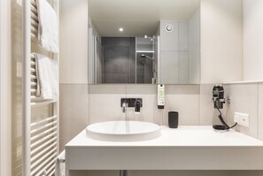 Shower, towels, toilet paper