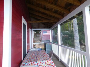 Outdoor dining - Traditional Waterfront Maine Cottage on Long Lake with great swimming. (Naples)