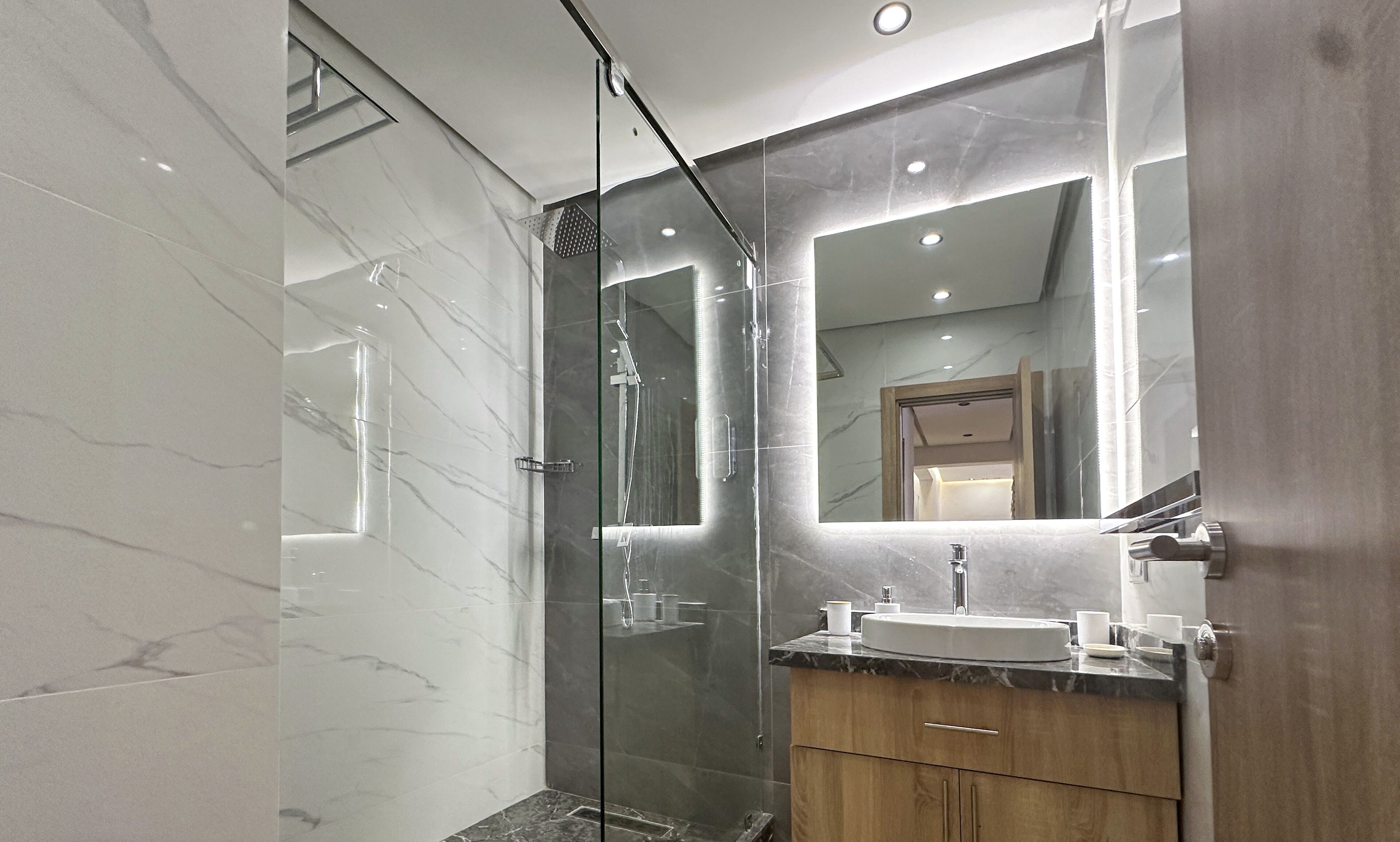 Design Apartment | Bathroom | Rainfall showerhead, bidet, towels, soap