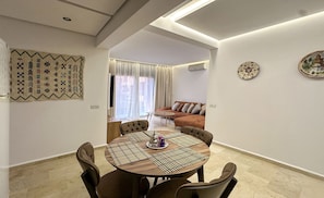 Design Apartment | Living area | 60-inch Smart TV with satellite channels, Netflix, pay movies - ZAYANE HOMES (Marrakech)
