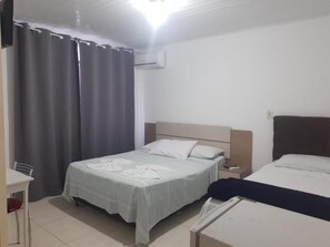 Desk, laptop workspace, free WiFi, bed sheets