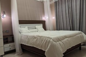 1 chambre, fer et planche Ă repasser, Wi-Fi, draps fournis