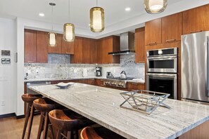 Fridge, microwave, oven, stovetop - The Lion Residences E505 (Vail)