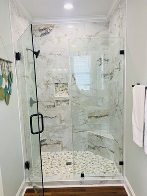 Shower, hair dryer, towels, soap