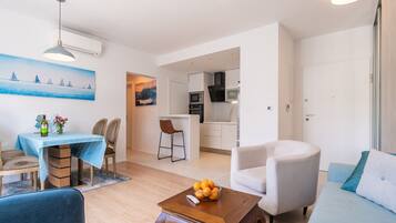Apartment (Apartment Marcus Mai - Two Bedroom Ap) | Living room | 32-inch flat-screen TV with digital channels