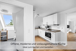 Fridge, microwave, oven, stovetop - Moderne und Stilvolle Ferienwohnung für 4 Personen in Strandnähe (Fehmarn)
