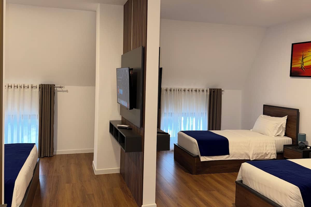 Habitación cuádruple | Wifi gratis y ropa de cama