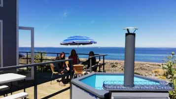 Cabaña familiar, vista al mar | Terraza o patio
