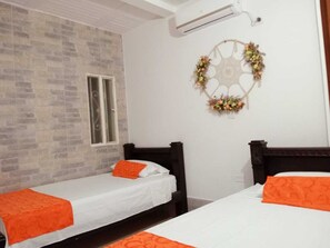 Basic Room, 2 Twin Beds | Free WiFi, bed sheets - Hotel Angel Maria (Puerto Triunfo)