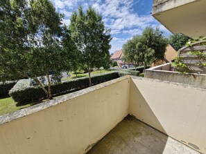 Stroll through a peaceful neighborhood with beautifully maintained gardens and a serene atmosphere.