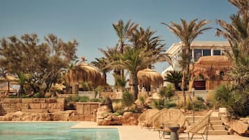 Outdoor pool, free pool cabanas, pool umbrellas