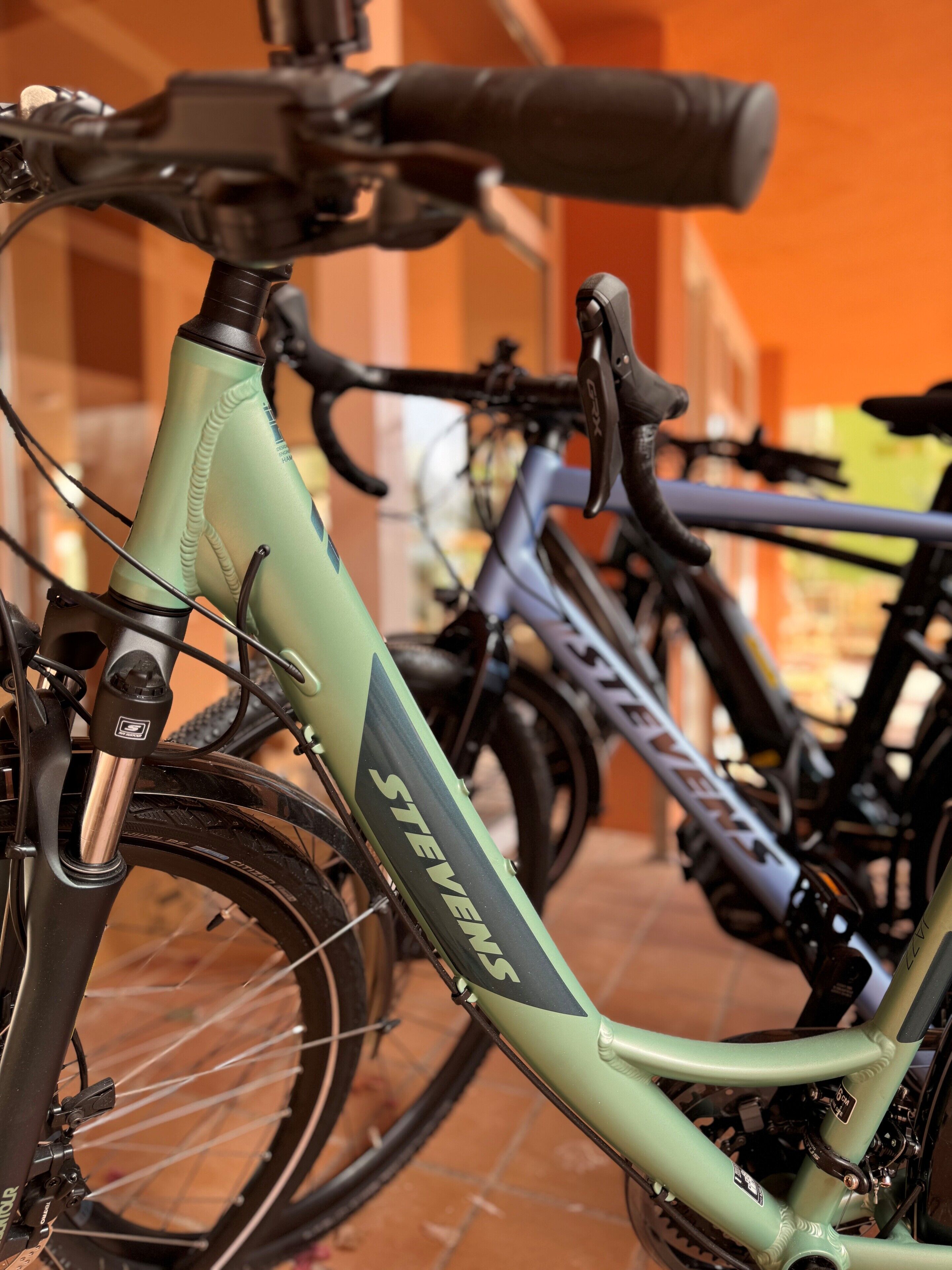 A close-up of a bicycle with the brand name "STEVENS" visible on the frame.
