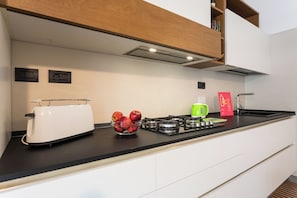 Apartment | Private kitchen | Fridge, oven, stovetop, dishwasher