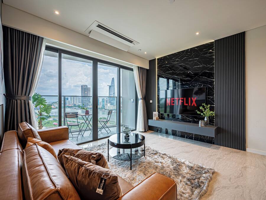 Apartamento superior, 2 quartos, banheiro privativo, vista para a cidade | Área de estar