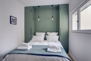 3 habitaciones, tabla de planchar con plancha, wifi y ropa de cama