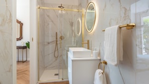 Shower, hair dryer, bidet, towels