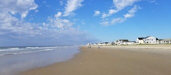 Quaint 2 bedroom cottage across the street from the beach with private yard.