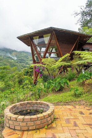 Deluxe Cabin, River View | 1 bedroom, down comforters, minibar, individually decorated