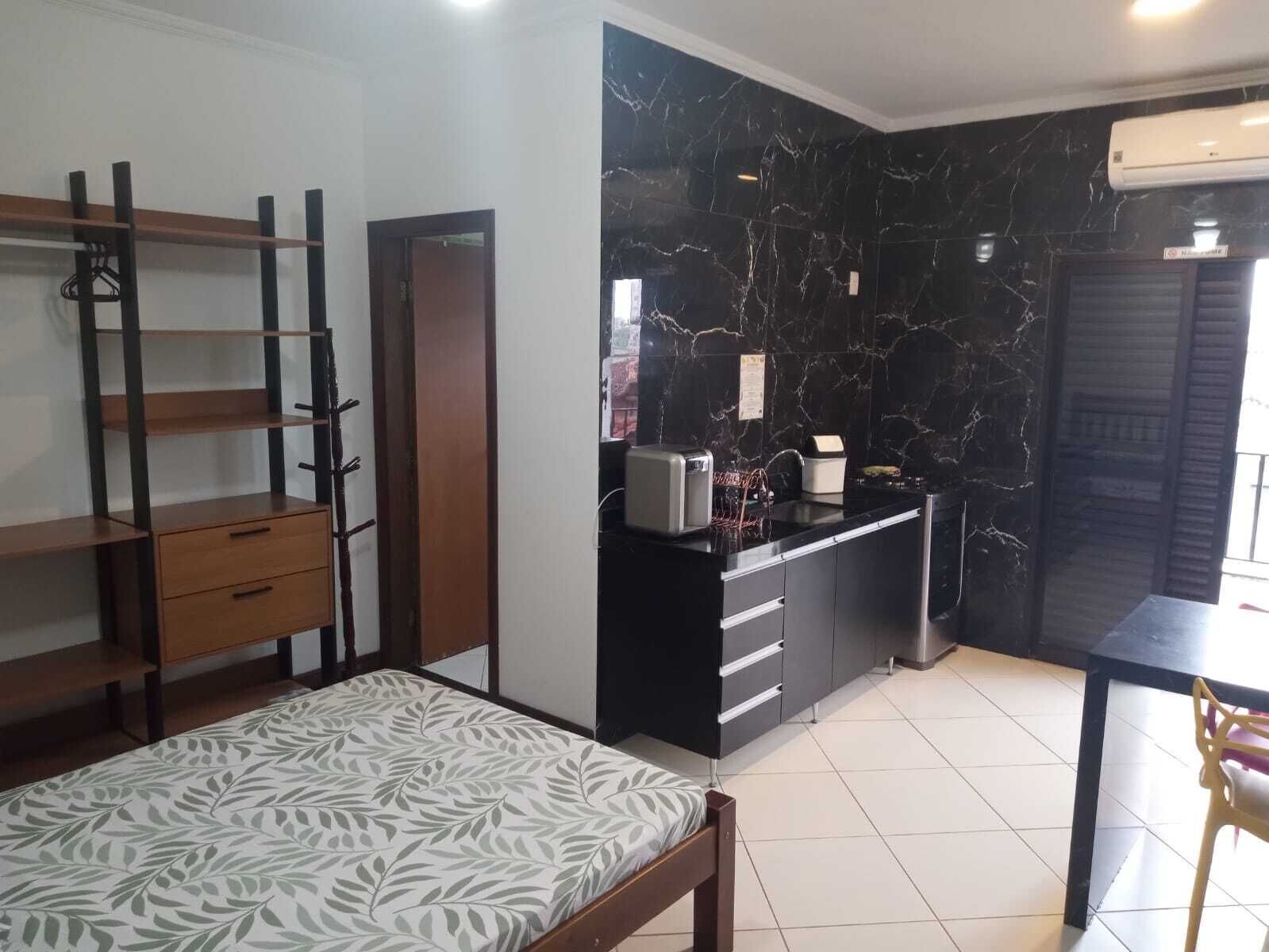 Deluxe Studio, Balcony, City View | Living area | 21-inch Smart TV with satellite channels