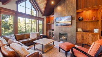 Smart TV, fireplace, foosball, books