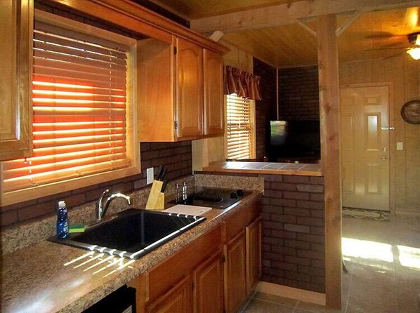 Fridge, microwave, coffee/tea maker, toaster