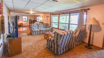 Smart TV, DVD player, foosball, books