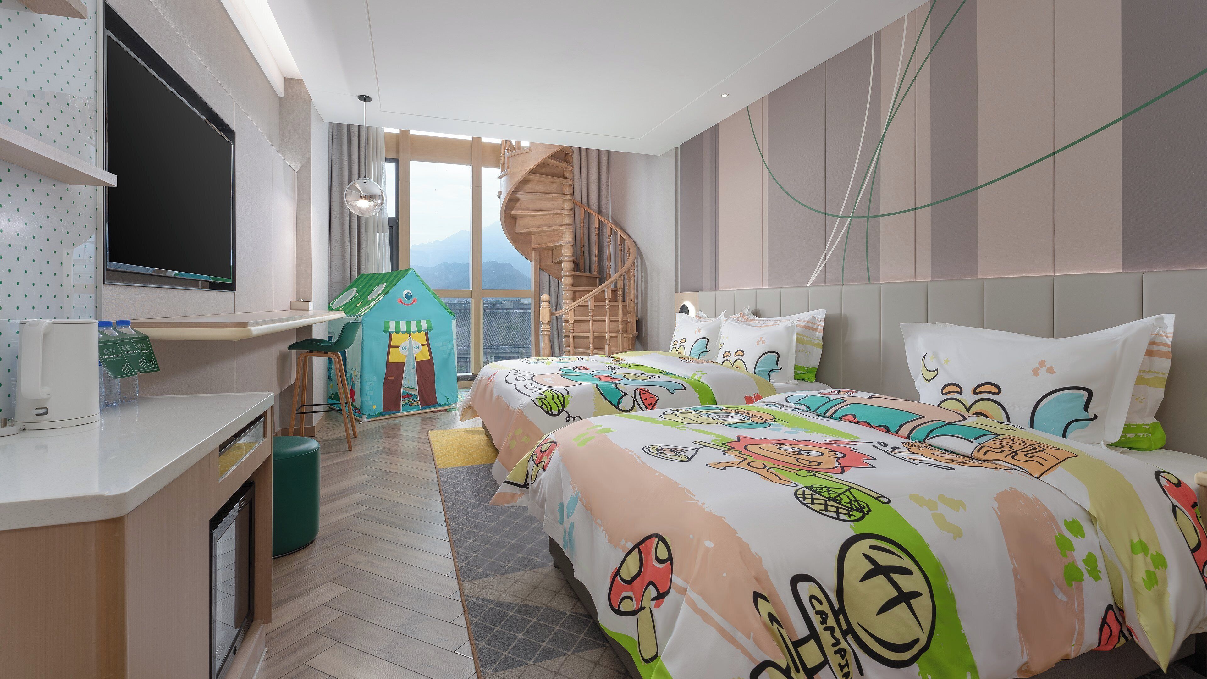 A modern bedroom with two beds, a TV, a desk, and a spiral staircase.
