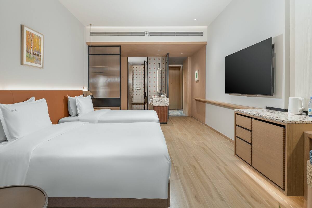 Down comforters, minibar, in-room safe, iron/ironing board
