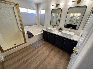 Shower, jetted tub, hair dryer, towels