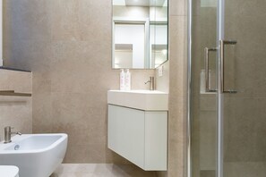 Apartment | Bathroom | Shower, hair dryer, bidet, towels - Cozy Studio in Chiaia district by Wonderful Italy (Naples)