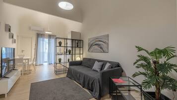 Apartment | Living area | 35-inch TV with digital channels