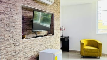 Premium Suite, City View | 1 bedroom, in-room safe, desk, laptop workspace