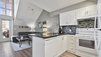 Apartamento executivo | Cozinha privada | Micro-ondas, cafeteira/chaleira, chaleira elétrica