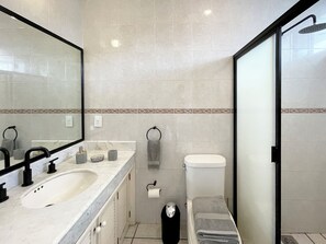 Shower, hair dryer, towels, soap