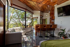 Deluxe Studio, 1 King Bed, Balcony, Mountain View | Living area | LED TV - Finca Sunset Monteverde (Monteverde)